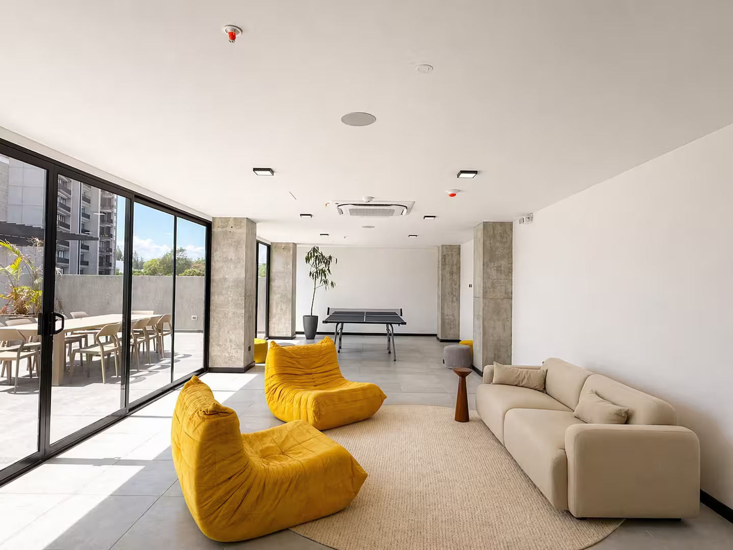 Event room and lounge with seating and city views at Art Haus Tower