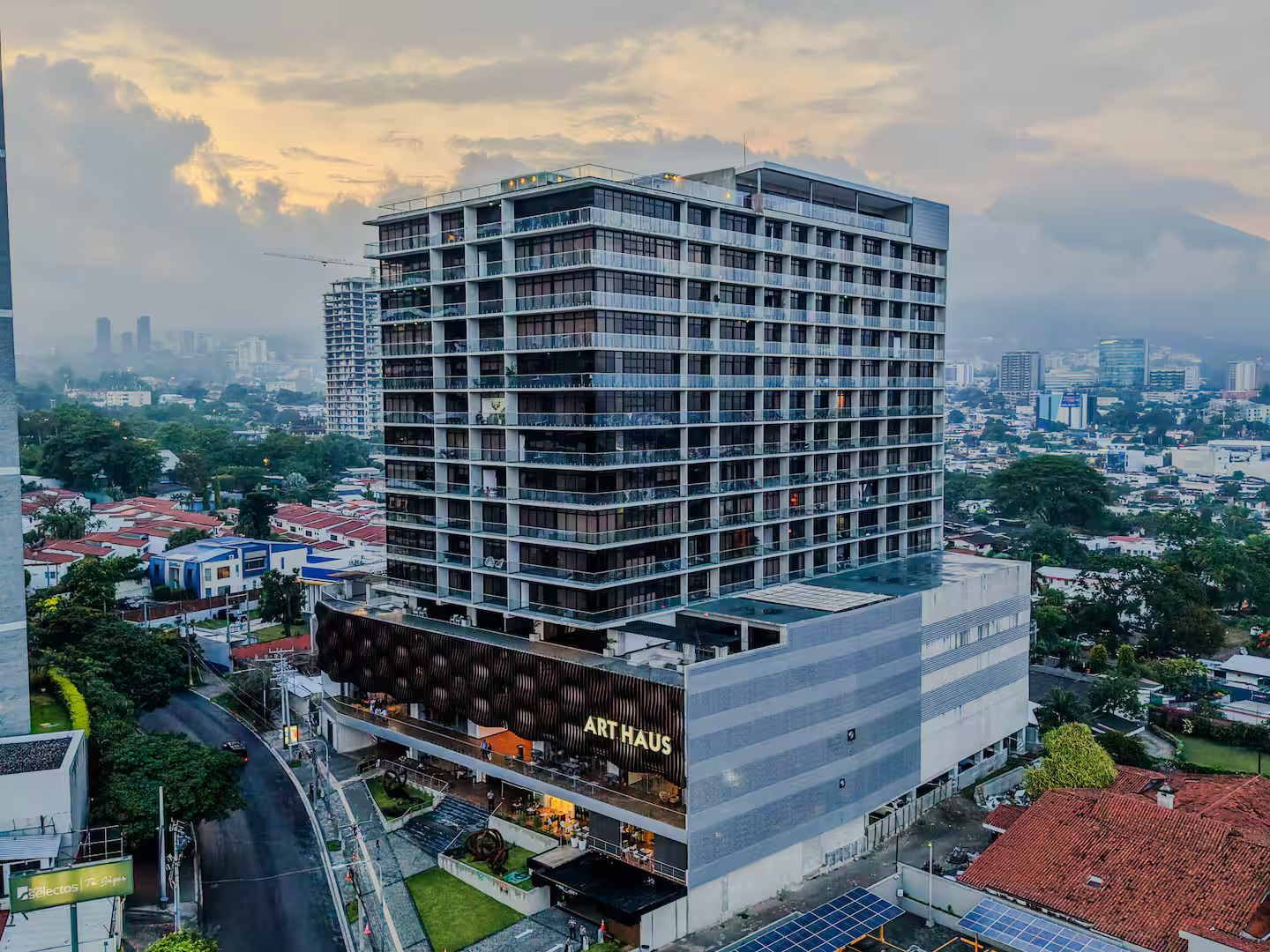 Art Haus Tower building facade at sunset in San Benito, San Salvador